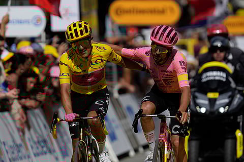 Richard Carapaz and teammate Ben Healy crosses the finish line